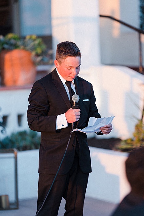 kids giving wedding toasts